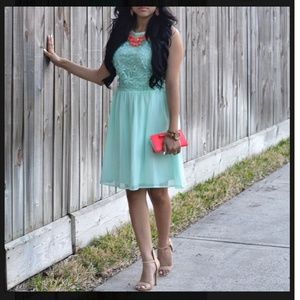 Mint flowy dress with pace flowers. Size L